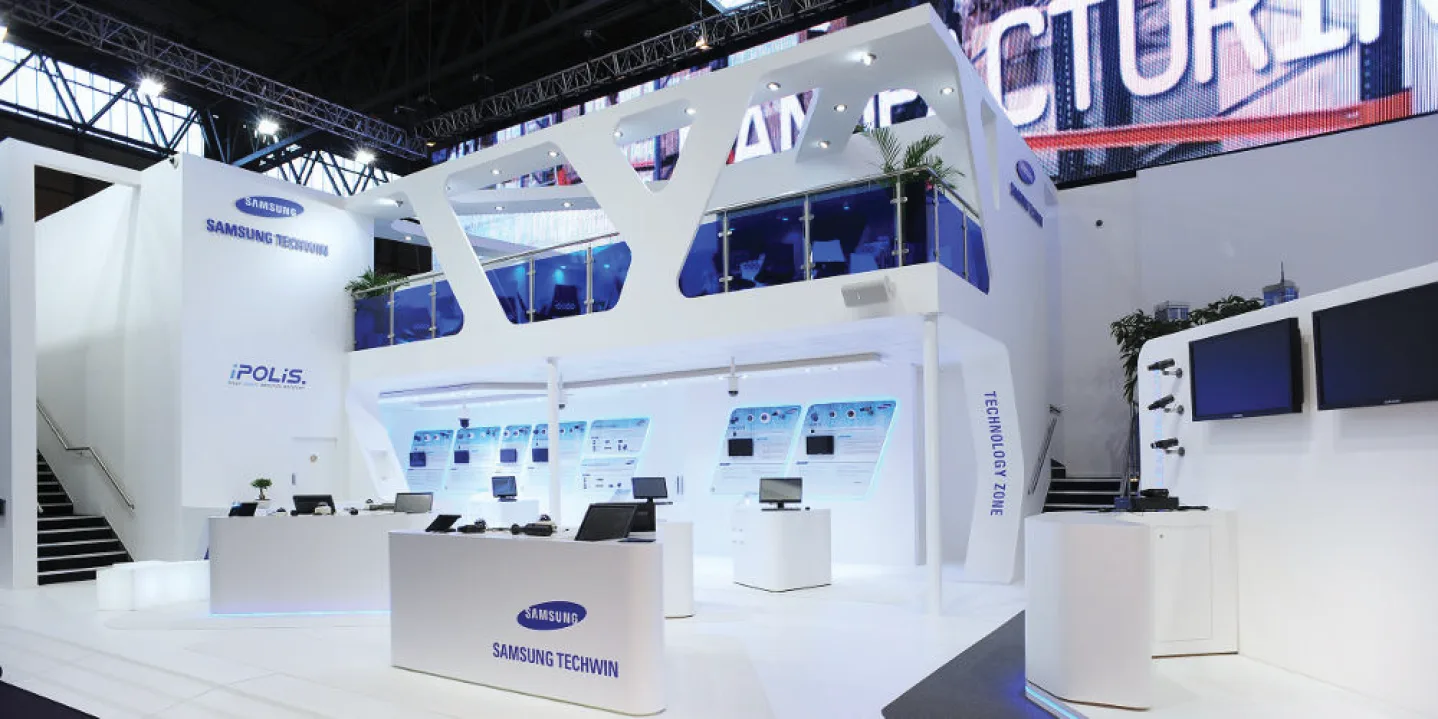 Futuristic Samsung Techwin booth interior with technology demonstration area